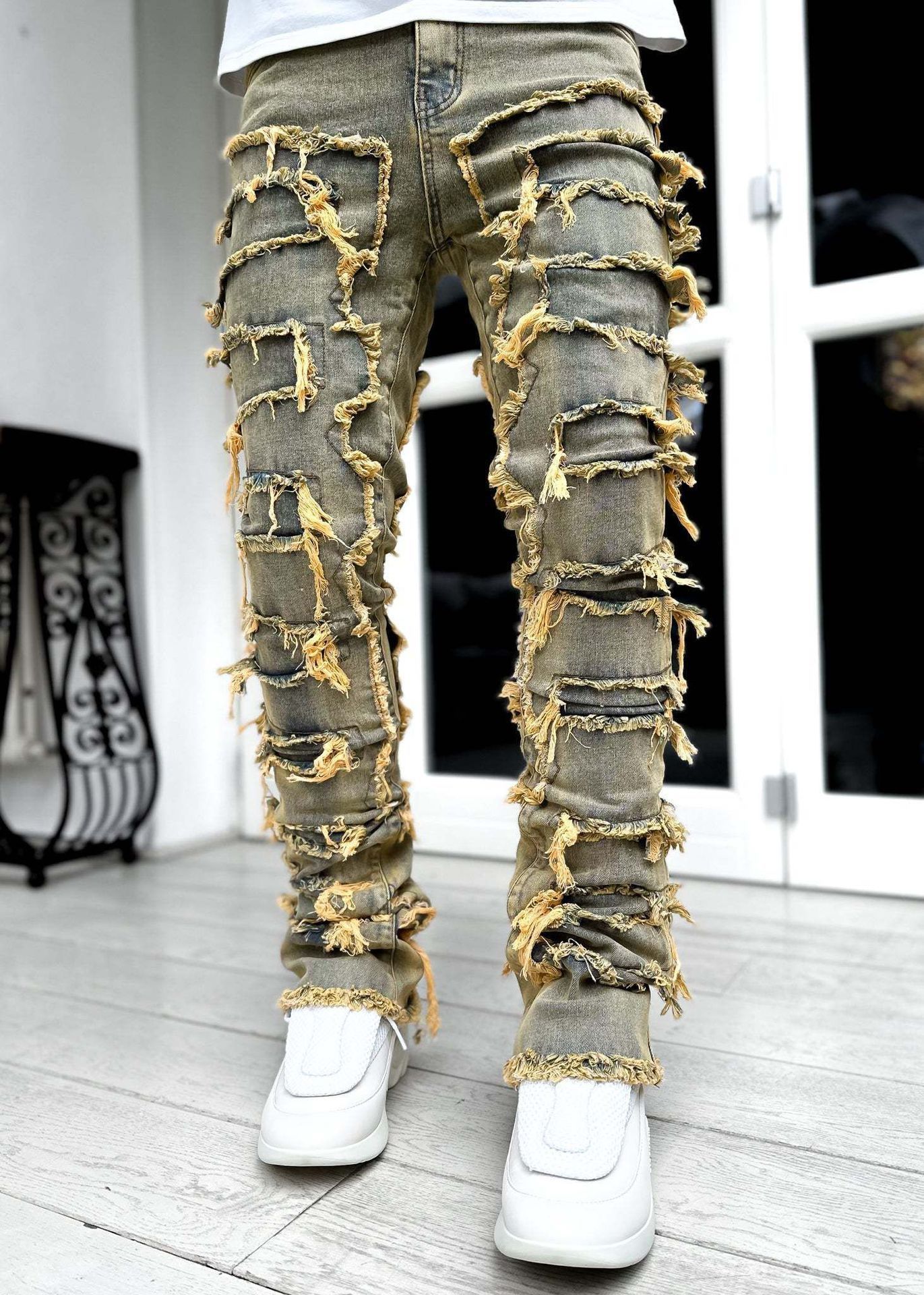 Men trousers individual patched pants with tight fit and stacked jeans style