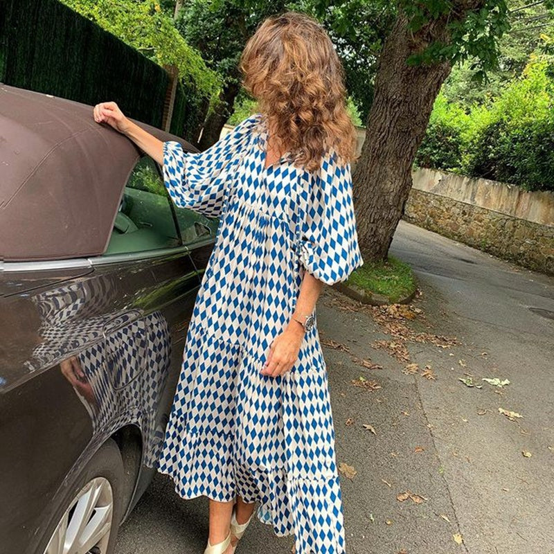 Summer women’s vintage printed bohemian dress with V-neck and loose maxi fit