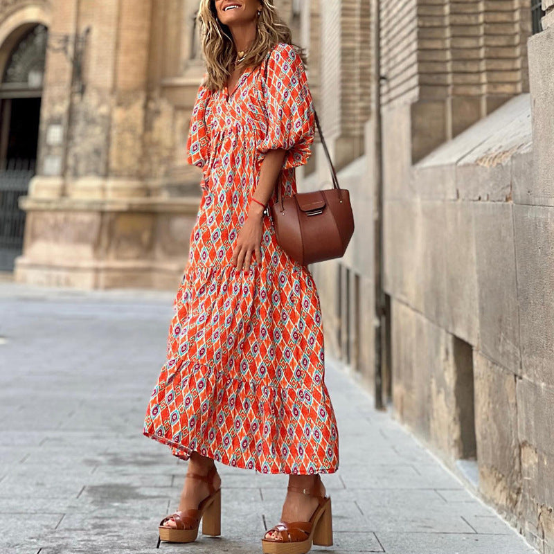 Summer women’s vintage printed bohemian dress with V-neck and loose maxi fit