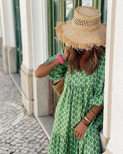 Summer women’s vintage printed bohemian dress with V-neck and loose maxi fit