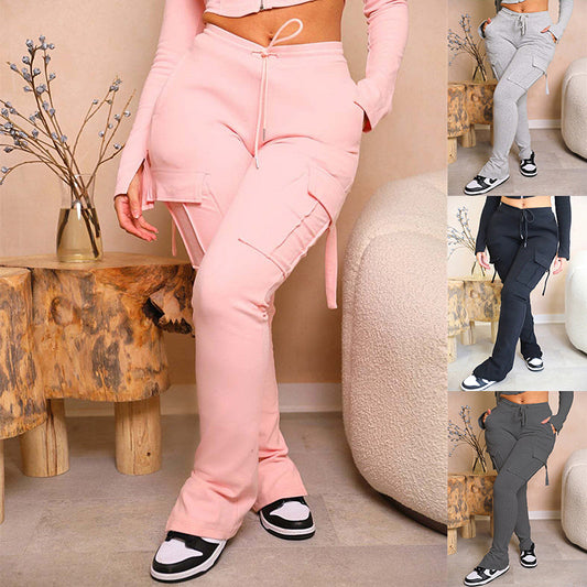 Women’s cargo pants with pockets, high waist drawstring, and wide leg cut