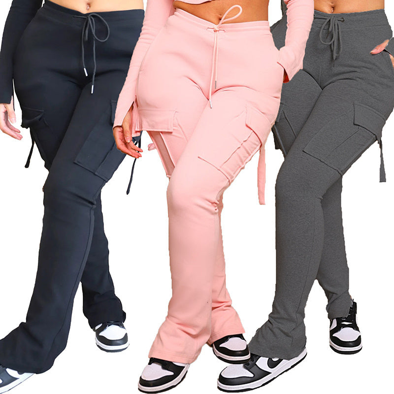 Women’s cargo pants with pockets, high waist drawstring, and wide leg cut