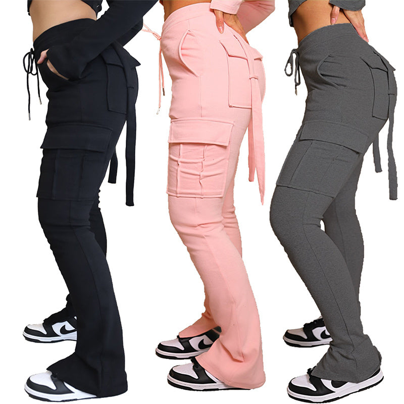Women’s cargo pants with pockets, high waist drawstring, and wide leg cut